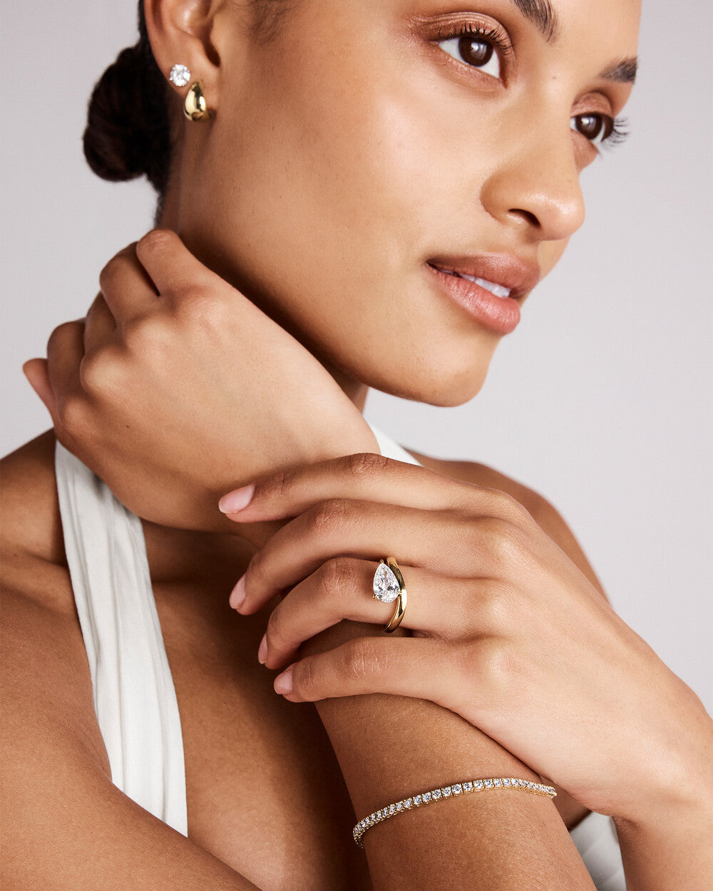 Aurora Twist Pear Diamond Ring in Yellow Gold