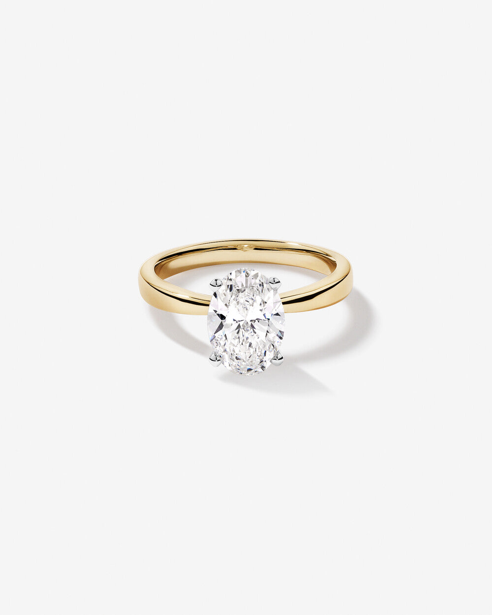Celeste Oval Solitaire Diamond Ring in Yellow Gold