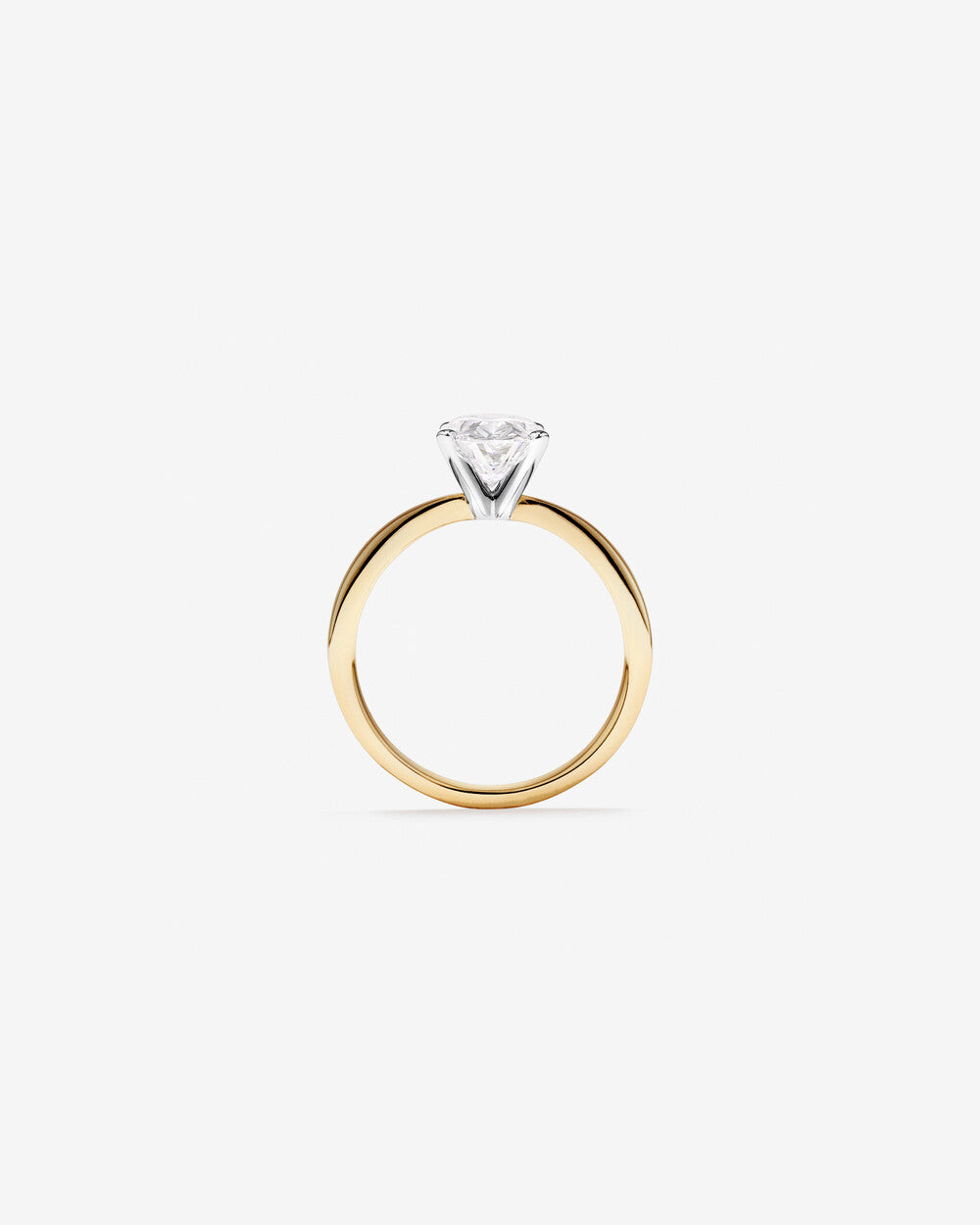 Celeste Oval Solitaire Diamond Ring in Yellow Gold