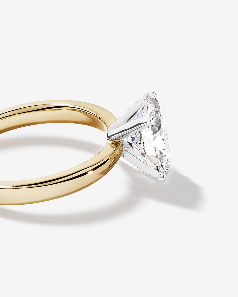 Celeste Oval Solitaire Diamond Ring in Yellow Gold