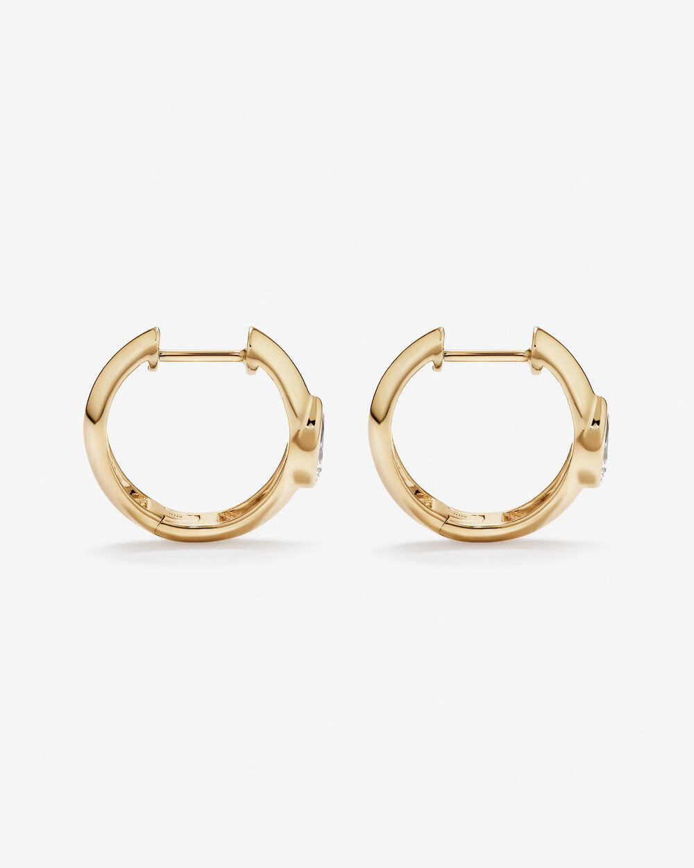 Pear Diamond Huggie Hoop Earrings in Yellow Gold