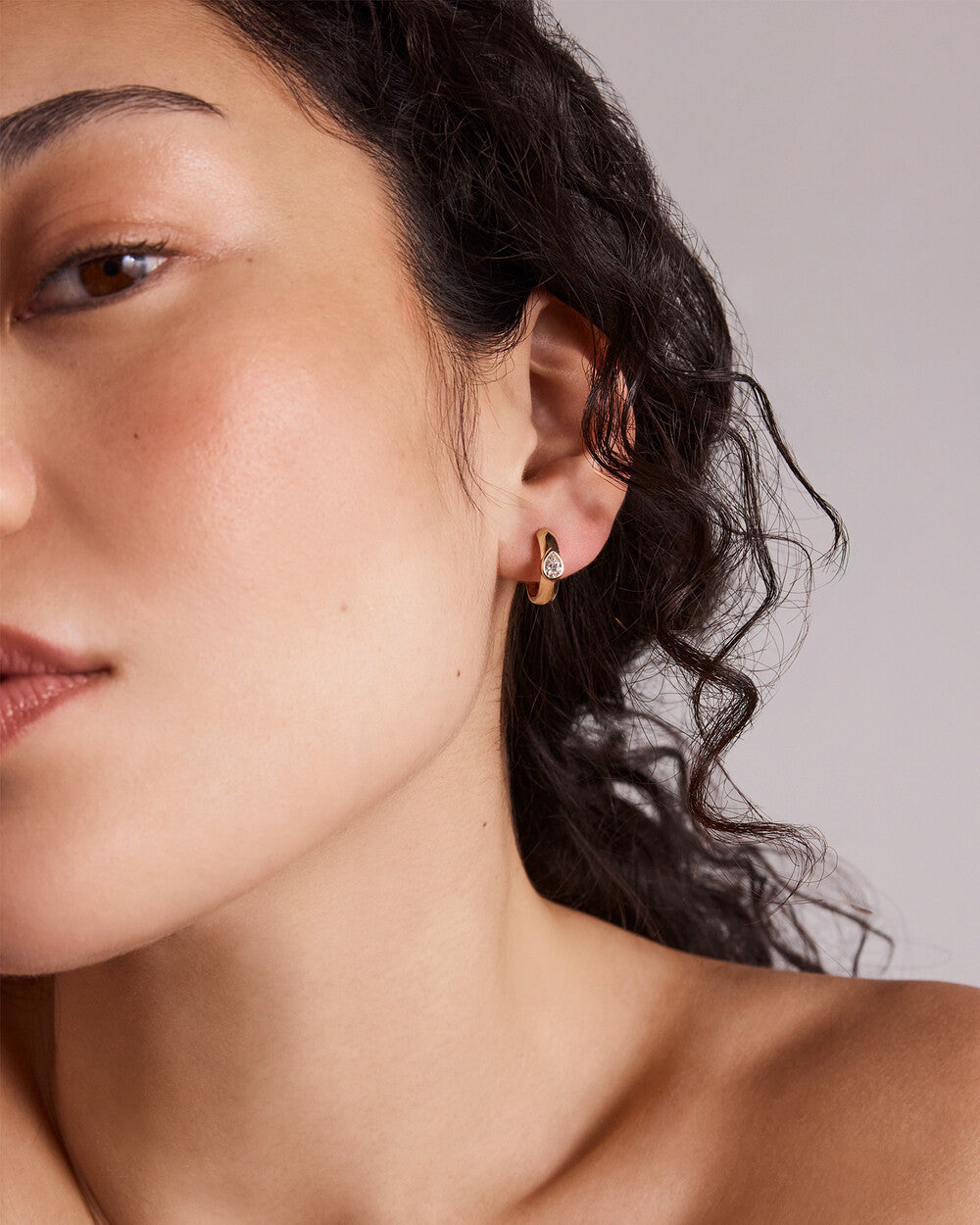 Pear Diamond Huggie Hoop Earrings in Yellow Gold