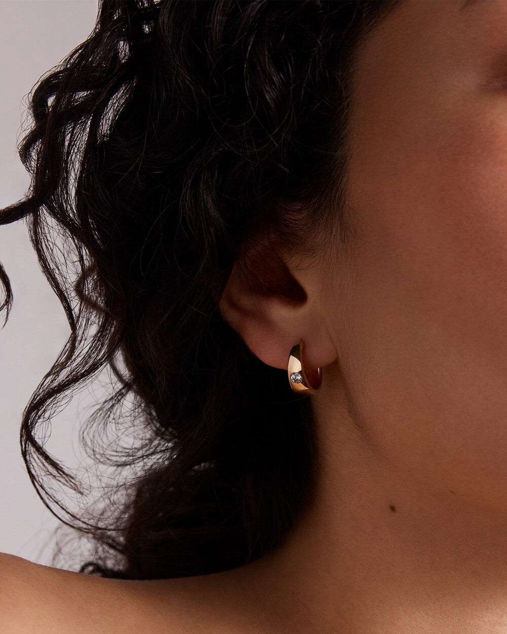 Diamond Flush-Set Huggie Hoop Earrings in Yellow Gold