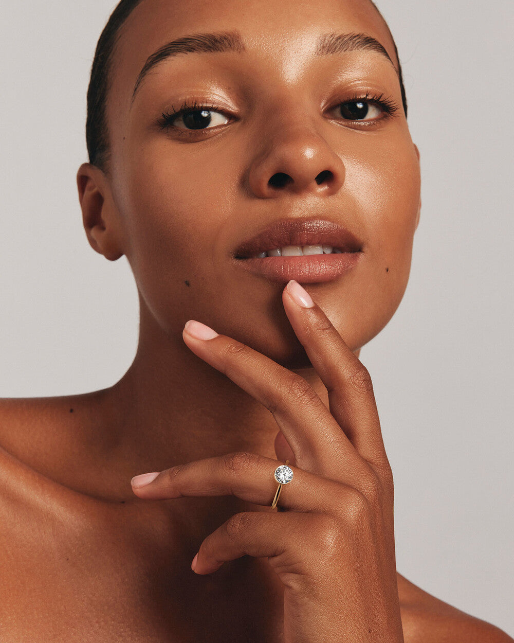 Round Bezel Set Lab Grown Diamond Ring in Rose Gold