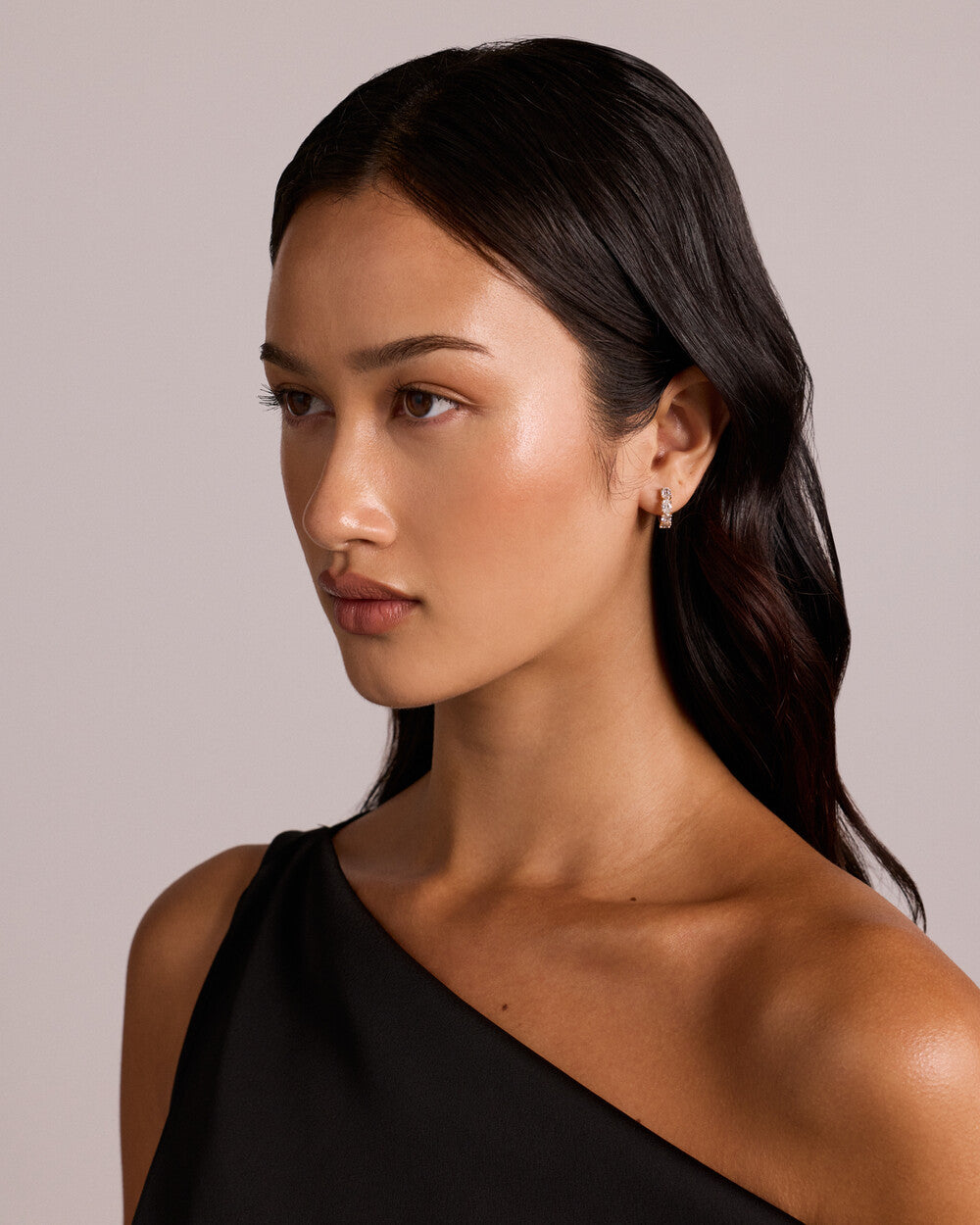 Luxe Oval Brilliance Diamond Huggie Earrings in Yellow Gold